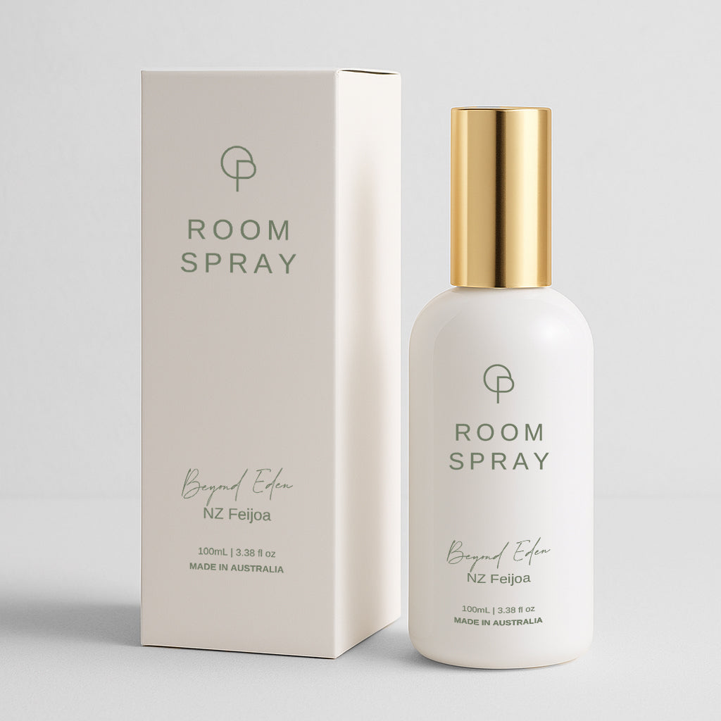 Room spray bottle and packaging on a light gray background